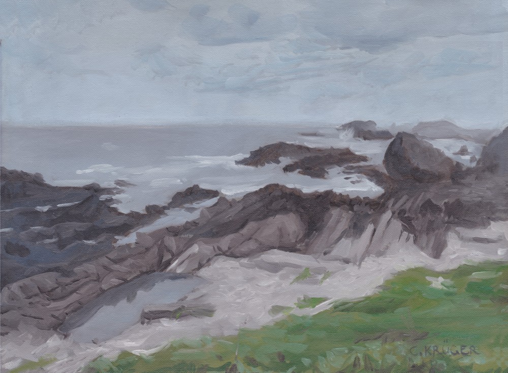 a beach and seascape with rocks